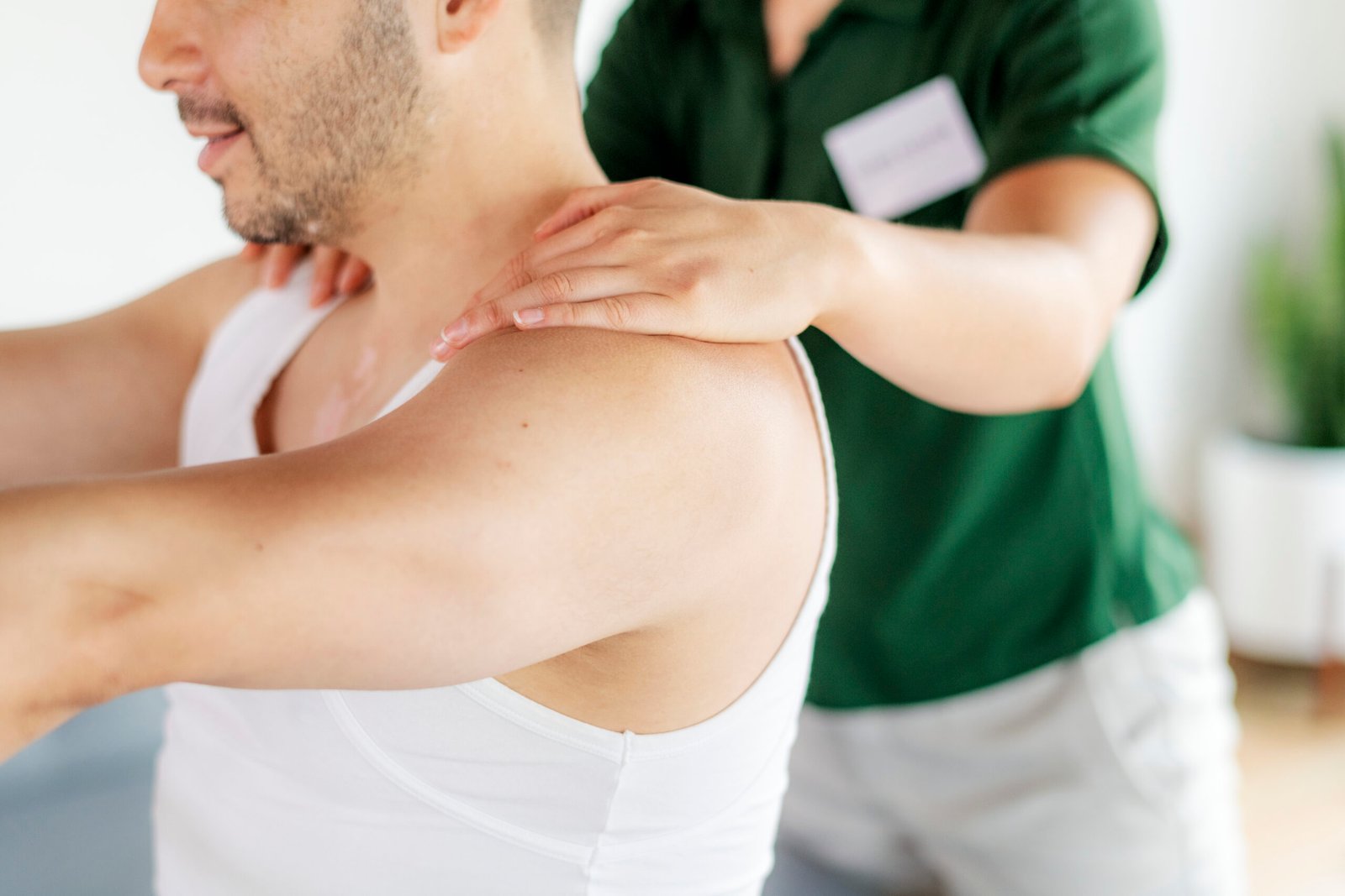 Injured man with a physical therapist
